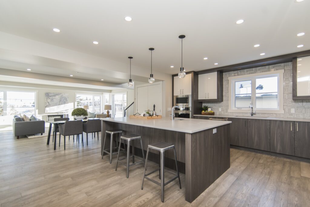 A beautiful shot of a modern house kitchen and dining room